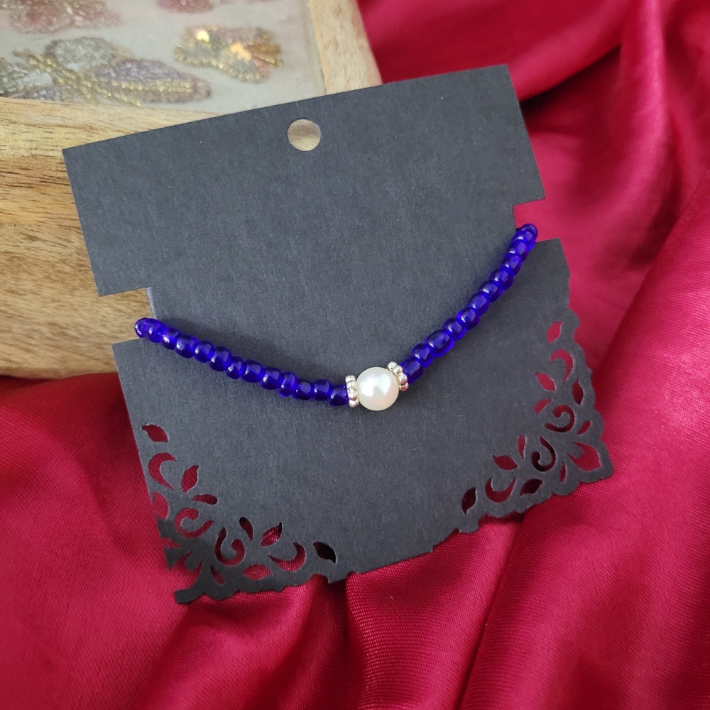 Elegant Blue Beaded Bracelet with Pearl Accent